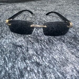 Stylish Black and Gold cartier glasses